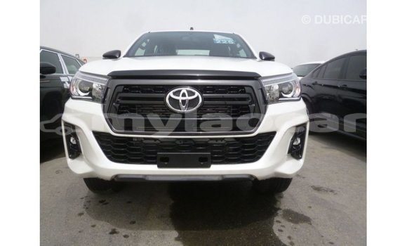 Buy Import Toyota Hilux White Car in Import - Dubai in Attapeu Province Buy Import Toyota Hilux White Car in Import - Dubai in Attapeu Province