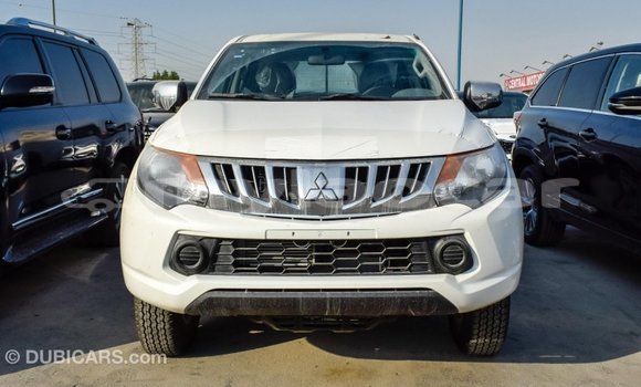 Buy Import Mitsubishi L200 White Car in Import - Dubai in Attapeu Province Buy Import Mitsubishi L200 White Car in Import - Dubai in Attapeu Province
