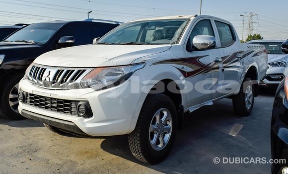Buy Import Mitsubishi L200 White Car in Import - Dubai in Attapeu Province Buy Import Mitsubishi L200 White Car in Import - Dubai in Attapeu Province