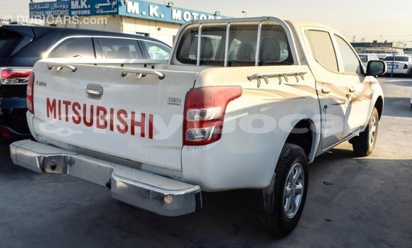 Buy Import Mitsubishi L200 White Car in Import - Dubai in Attapeu Province Buy Import Mitsubishi L200 White Car in Import - Dubai in Attapeu Province