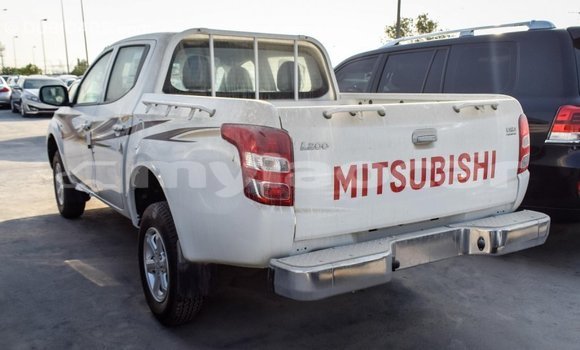 Buy Import Mitsubishi L200 White Car in Import - Dubai in Attapeu Province Buy Import Mitsubishi L200 White Car in Import - Dubai in Attapeu Province