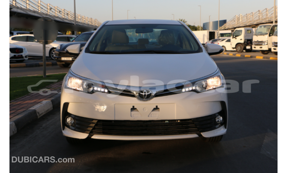 Buy Import Toyota Corolla White Car in Import - Dubai in Attapeu Province Buy Import Toyota Corolla White Car in Import - Dubai in Attapeu Province