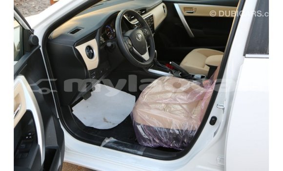 Buy Import Toyota Corolla White Car in Import - Dubai in Attapeu Province Buy Import Toyota Corolla White Car in Import - Dubai in Attapeu Province