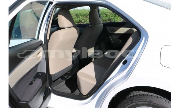 Buy Import Toyota Corolla White Car in Import - Dubai in Attapeu Province Buy Import Toyota Corolla White Car in Import - Dubai in Attapeu Province