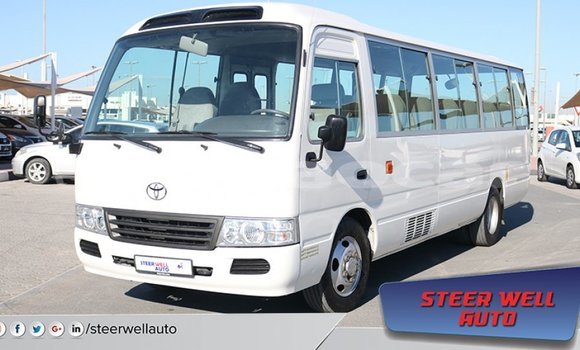 Buy Import Toyota Coaster White Car in Import - Dubai in Attapeu Province Buy Import Toyota Coaster White Car in Import - Dubai in Attapeu Province