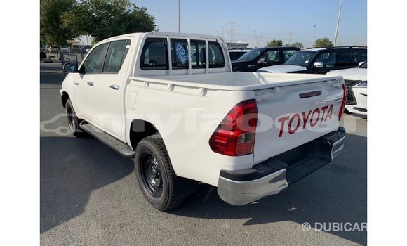 Buy Import Toyota Hilux White Car in Import - Dubai in Attapeu Province Buy Import Toyota Hilux White Car in Import - Dubai in Attapeu Province