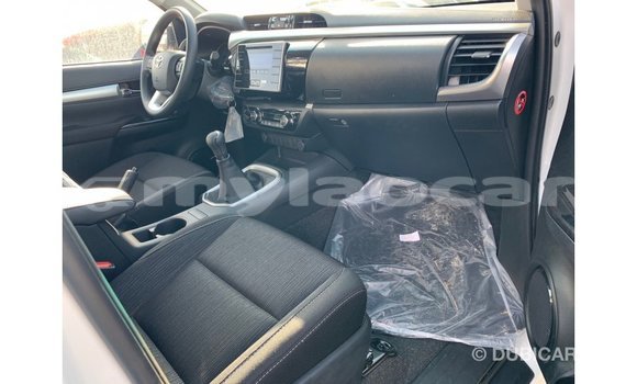 Buy Import Toyota Hilux White Car in Import - Dubai in Attapeu Province Buy Import Toyota Hilux White Car in Import - Dubai in Attapeu Province