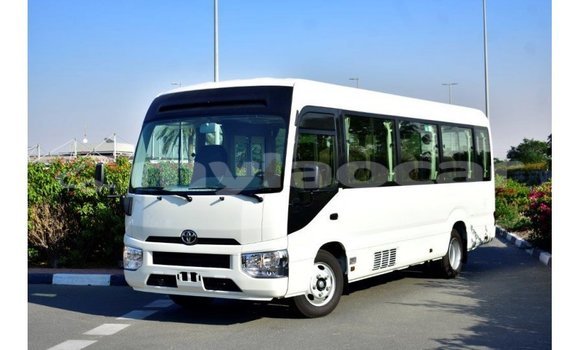Acheter Import Voiture Toyota Coaster Blanc à Import - Dubai, Attapeu Province Acheter Import Voiture Toyota Coaster Blanc à Import - Dubai, Attapeu Province