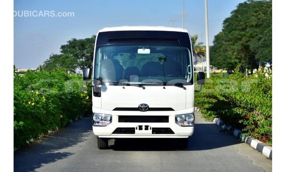 Acheter Import Voiture Toyota Coaster Blanc à Import - Dubai, Attapeu Province Acheter Import Voiture Toyota Coaster Blanc à Import - Dubai, Attapeu Province