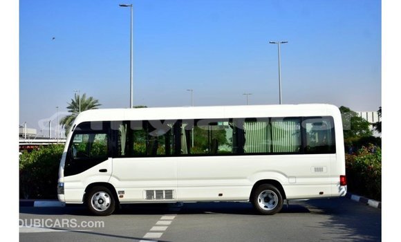 Acheter Import Voiture Toyota Coaster Blanc à Import - Dubai, Attapeu Province Acheter Import Voiture Toyota Coaster Blanc à Import - Dubai, Attapeu Province