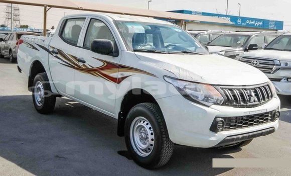 Buy Import Mitsubishi L200 White Car in Import - Dubai in Attapeu Province Buy Import Mitsubishi L200 White Car in Import - Dubai in Attapeu Province