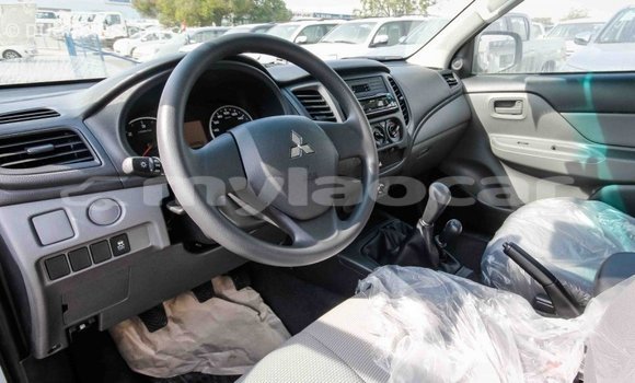 Buy Import Mitsubishi L200 White Car in Import - Dubai in Attapeu Province Buy Import Mitsubishi L200 White Car in Import - Dubai in Attapeu Province