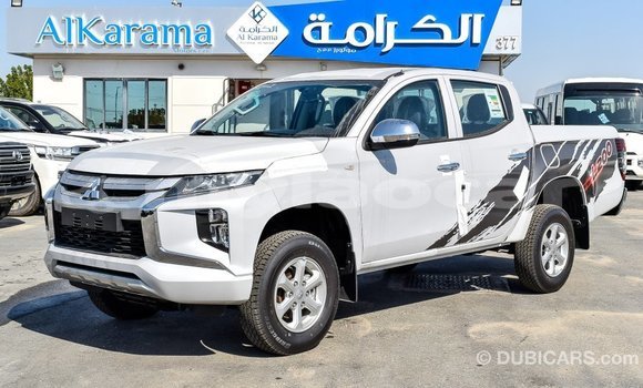 Buy Import Mitsubishi L200 White Car in Import - Dubai in Attapeu Province Buy Import Mitsubishi L200 White Car in Import - Dubai in Attapeu Province