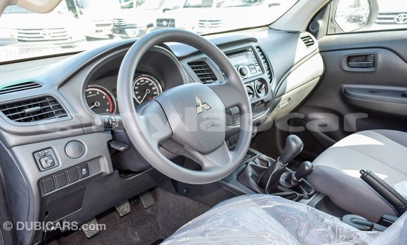 Buy Import Mitsubishi L200 White Car in Import - Dubai in Attapeu Province Buy Import Mitsubishi L200 White Car in Import - Dubai in Attapeu Province