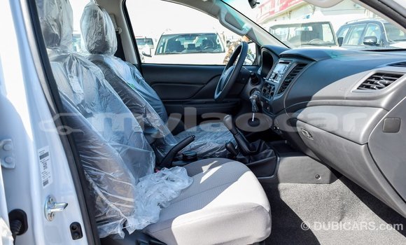 Buy Import Mitsubishi L200 White Car in Import - Dubai in Attapeu Province Buy Import Mitsubishi L200 White Car in Import - Dubai in Attapeu Province