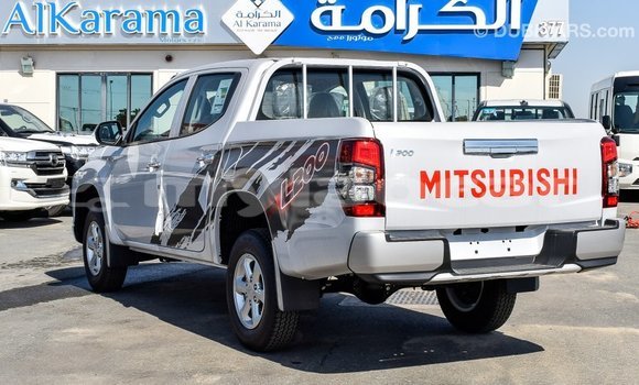 Buy Import Mitsubishi L200 White Car in Import - Dubai in Attapeu Province Buy Import Mitsubishi L200 White Car in Import - Dubai in Attapeu Province
