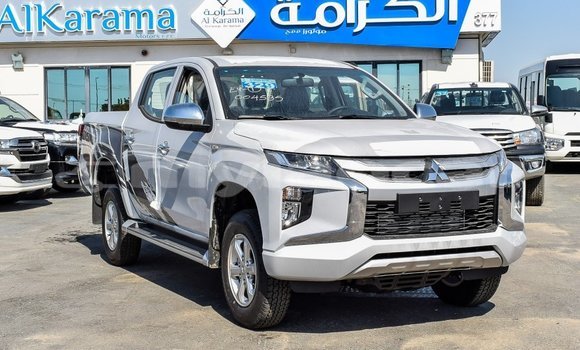 Buy Import Mitsubishi L200 White Car in Import - Dubai in Attapeu Province Buy Import Mitsubishi L200 White Car in Import - Dubai in Attapeu Province