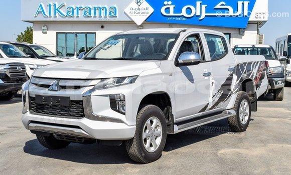 Buy Import Mitsubishi L200 White Car in Import - Dubai in Attapeu Province Buy Import Mitsubishi L200 White Car in Import - Dubai in Attapeu Province