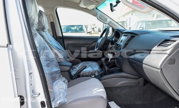 Buy Import Mitsubishi L200 White Car in Import - Dubai in Attapeu Province Buy Import Mitsubishi L200 White Car in Import - Dubai in Attapeu Province