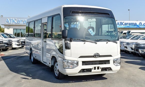 Buy Import Toyota Coaster White Car in Import - Dubai in Attapeu Province Buy Import Toyota Coaster White Car in Import - Dubai in Attapeu Province