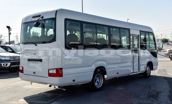 Buy Import Toyota Coaster White Car in Import - Dubai in Attapeu Province Buy Import Toyota Coaster White Car in Import - Dubai in Attapeu Province