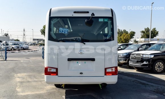Buy Import Toyota Coaster White Car in Import - Dubai in Attapeu Province Buy Import Toyota Coaster White Car in Import - Dubai in Attapeu Province