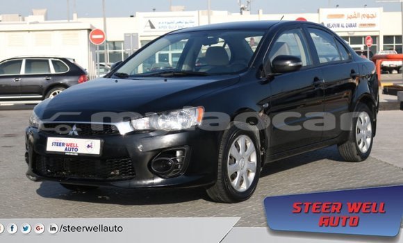Buy Import Mitsubishi Lancer Black Car in Import - Dubai in Attapeu Province Buy Import Mitsubishi Lancer Black Car in Import - Dubai in Attapeu Province