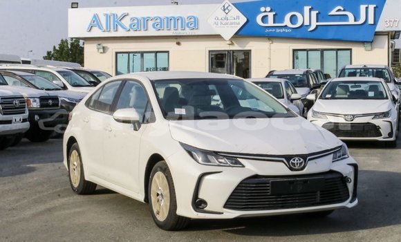Buy Import Toyota Corolla White Car in Import - Dubai in Attapeu Province Buy Import Toyota Corolla White Car in Import - Dubai in Attapeu Province