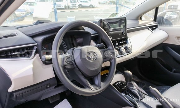 Buy Import Toyota Corolla White Car in Import - Dubai in Attapeu Province Buy Import Toyota Corolla White Car in Import - Dubai in Attapeu Province