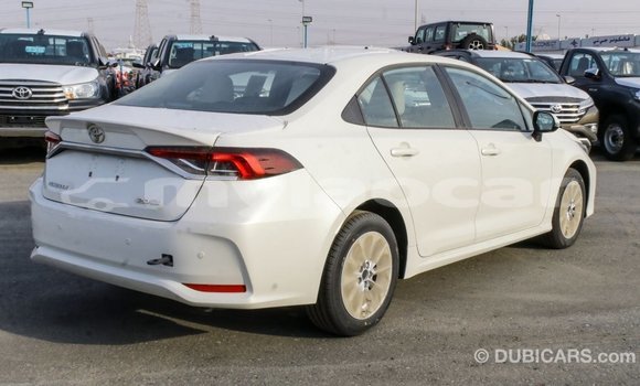 Buy Import Toyota Corolla White Car in Import - Dubai in Attapeu Province Buy Import Toyota Corolla White Car in Import - Dubai in Attapeu Province