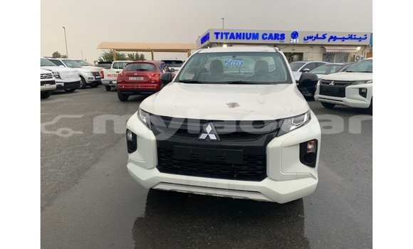 Buy Import Mitsubishi L200 White Car in Import - Dubai in Attapeu Province Buy Import Mitsubishi L200 White Car in Import - Dubai in Attapeu Province