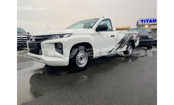 Buy Import Mitsubishi L200 White Car in Import - Dubai in Attapeu Province Buy Import Mitsubishi L200 White Car in Import - Dubai in Attapeu Province