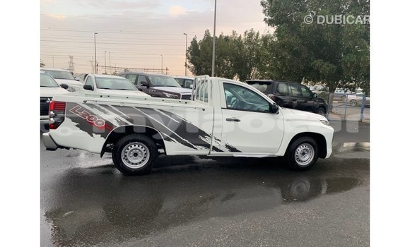 Buy Import Mitsubishi L200 White Car in Import - Dubai in Attapeu Province Buy Import Mitsubishi L200 White Car in Import - Dubai in Attapeu Province