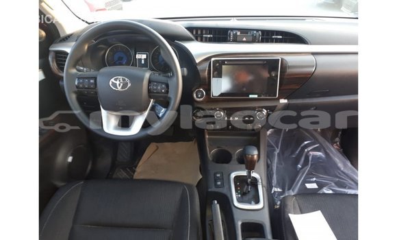 Buy Import Toyota Hilux Red Car in Import - Dubai in Attapeu Province Buy Import Toyota Hilux Red Car in Import - Dubai in Attapeu Province
