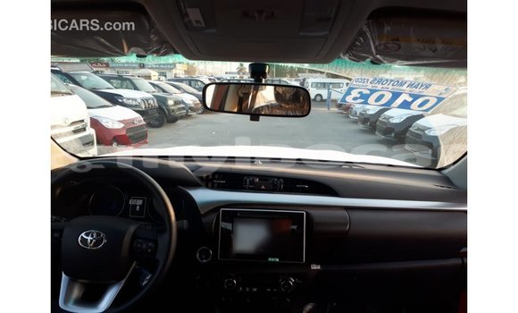 Buy Import Toyota Hilux Red Car in Import - Dubai in Attapeu Province Buy Import Toyota Hilux Red Car in Import - Dubai in Attapeu Province