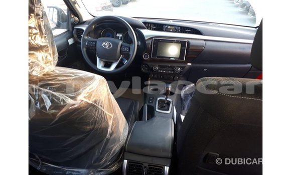 Buy Import Toyota Hilux Red Car in Import - Dubai in Attapeu Province Buy Import Toyota Hilux Red Car in Import - Dubai in Attapeu Province