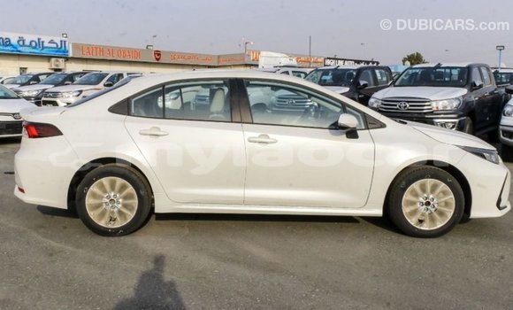 Buy Import Toyota Corolla White Car in Import - Dubai in Attapeu Province Buy Import Toyota Corolla White Car in Import - Dubai in Attapeu Province
