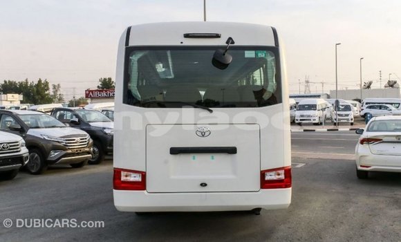 Buy Import Toyota Coaster White Car in Import - Dubai in Attapeu Province Buy Import Toyota Coaster White Car in Import - Dubai in Attapeu Province