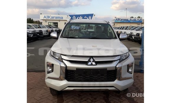 Buy Import Mitsubishi L200 White Car in Import - Dubai in Attapeu Province Buy Import Mitsubishi L200 White Car in Import - Dubai in Attapeu Province