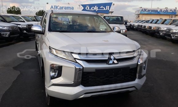 Buy Import Mitsubishi L200 White Car in Import - Dubai in Attapeu Province Buy Import Mitsubishi L200 White Car in Import - Dubai in Attapeu Province