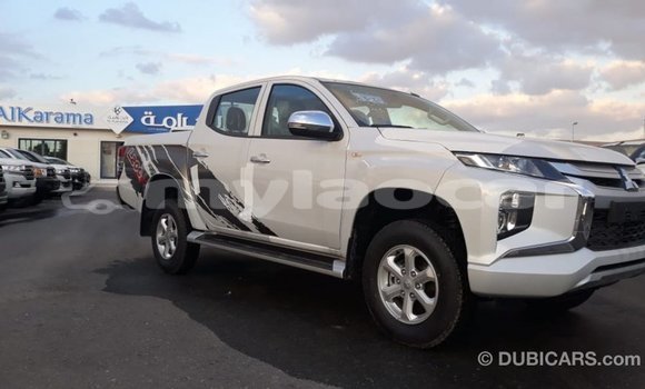 Buy Import Mitsubishi L200 White Car in Import - Dubai in Attapeu Province Buy Import Mitsubishi L200 White Car in Import - Dubai in Attapeu Province