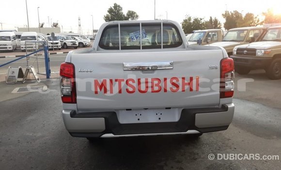 Buy Import Mitsubishi L200 White Car in Import - Dubai in Attapeu Province Buy Import Mitsubishi L200 White Car in Import - Dubai in Attapeu Province
