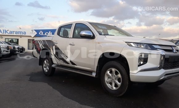 Buy Import Mitsubishi L200 White Car in Import - Dubai in Attapeu Province Buy Import Mitsubishi L200 White Car in Import - Dubai in Attapeu Province