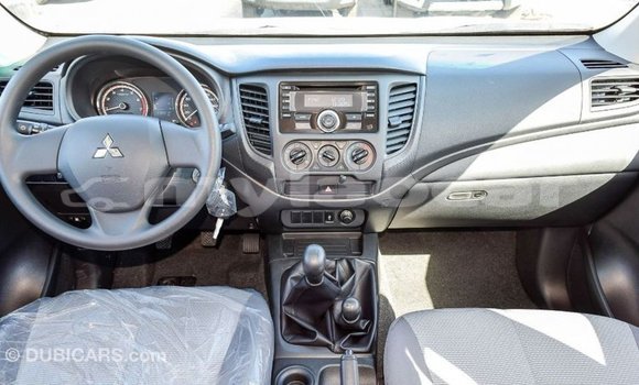 Buy Import Mitsubishi L200 White Car in Import - Dubai in Attapeu Province Buy Import Mitsubishi L200 White Car in Import - Dubai in Attapeu Province