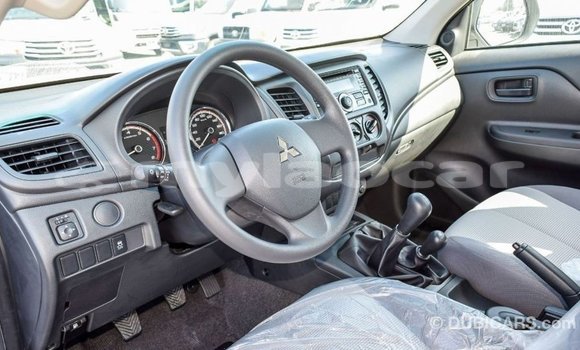 Buy Import Mitsubishi L200 White Car in Import - Dubai in Attapeu Province Buy Import Mitsubishi L200 White Car in Import - Dubai in Attapeu Province