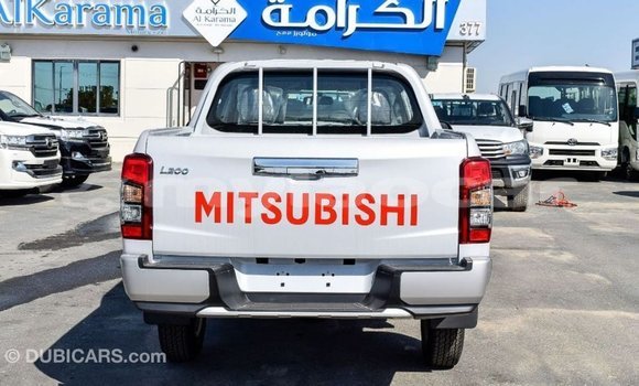 Buy Import Mitsubishi L200 White Car in Import - Dubai in Attapeu Province Buy Import Mitsubishi L200 White Car in Import - Dubai in Attapeu Province
