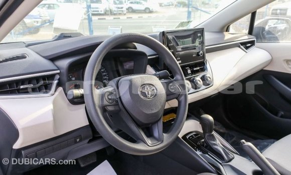 Buy Import Toyota Corolla White Car in Import - Dubai in Attapeu Province Buy Import Toyota Corolla White Car in Import - Dubai in Attapeu Province
