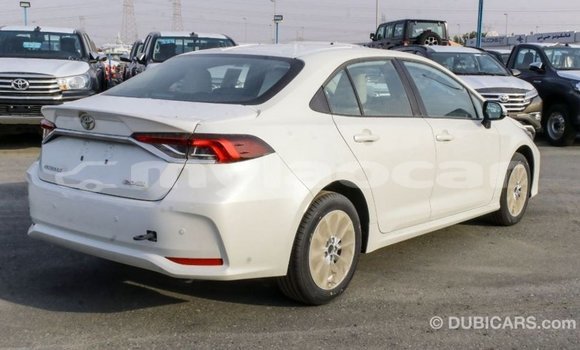 Buy Import Toyota Corolla White Car in Import - Dubai in Attapeu Province Buy Import Toyota Corolla White Car in Import - Dubai in Attapeu Province