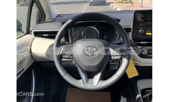 Buy Import Toyota Corolla White Car in Import - Dubai in Attapeu Province Buy Import Toyota Corolla White Car in Import - Dubai in Attapeu Province