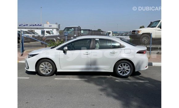 Buy Import Toyota Corolla White Car in Import - Dubai in Attapeu Province Buy Import Toyota Corolla White Car in Import - Dubai in Attapeu Province